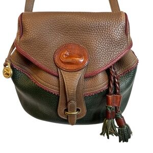 Dooney & Bourke Vintage Teton Leather Old West Trail Ride Saddle Bag.